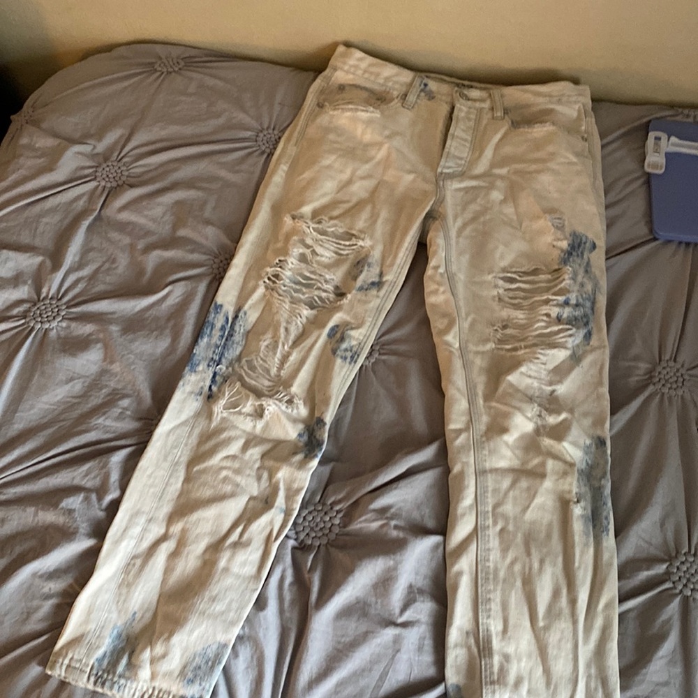 American Eagle ripped paint stained straight leg jeans